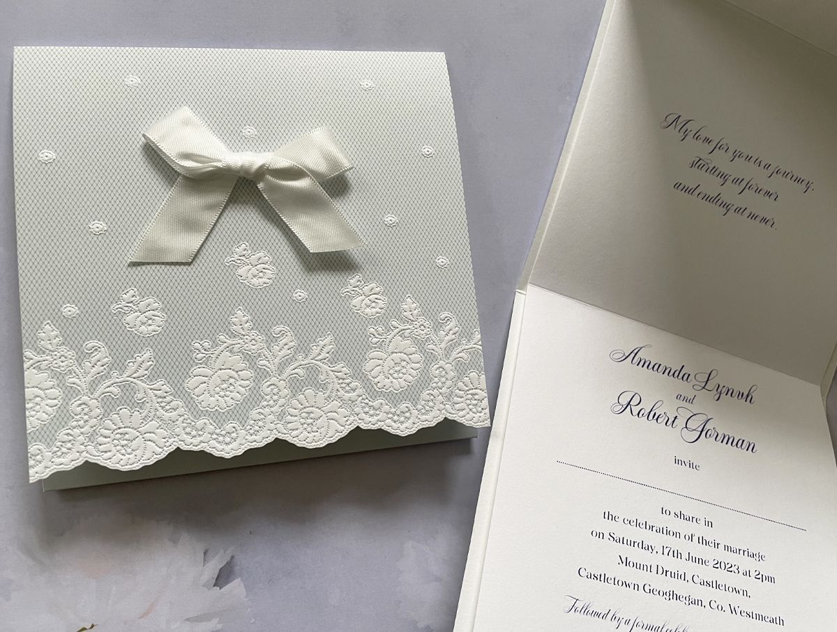 baby blue wedding invitations with floral embossments
