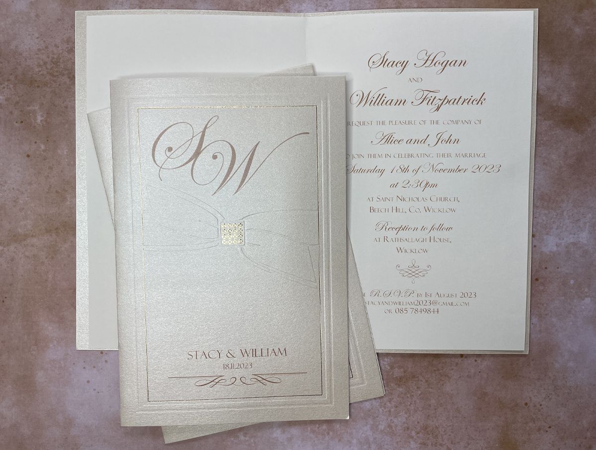 elegant cream embossed wedding invitation