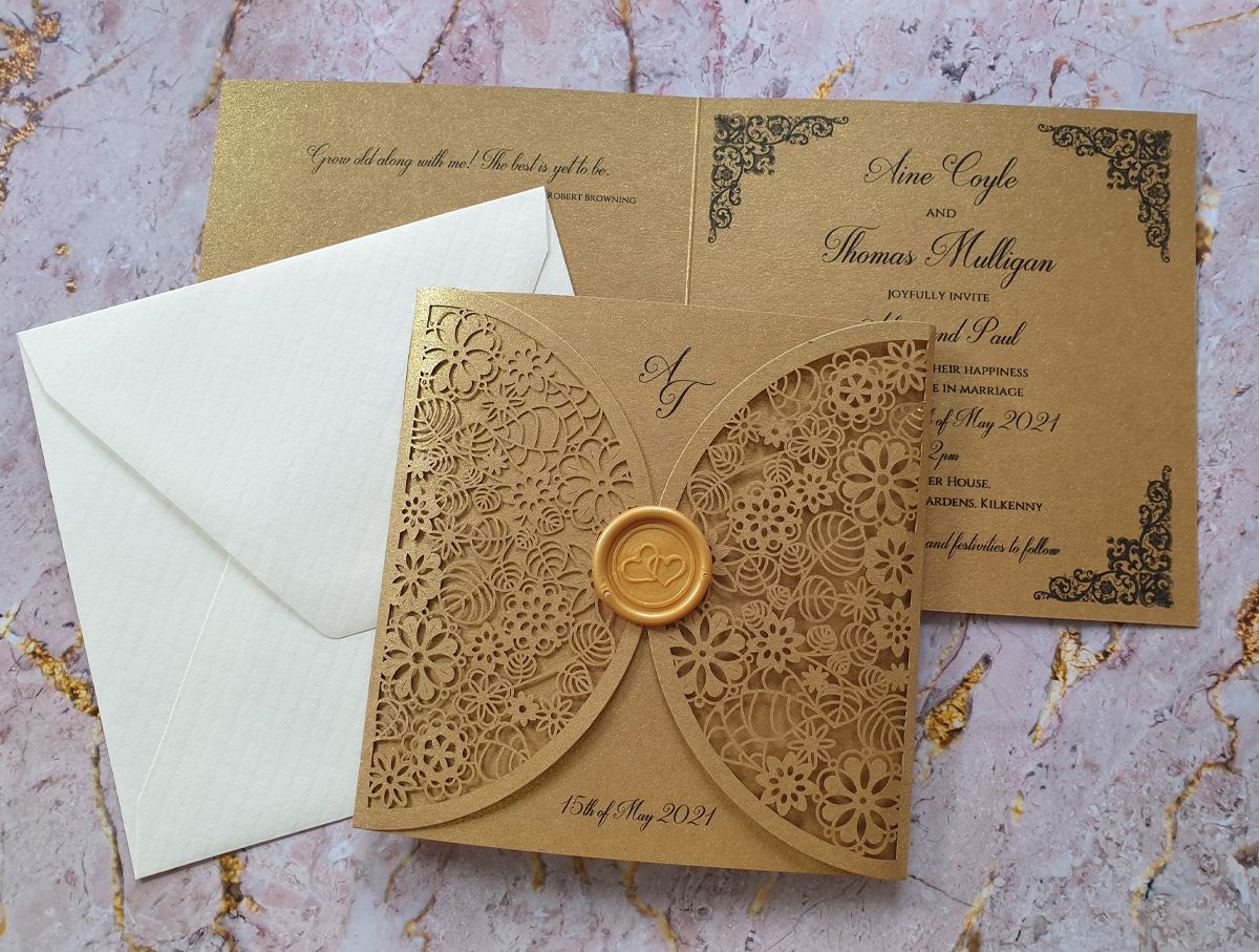Elegant gold laser cut wedding invitation