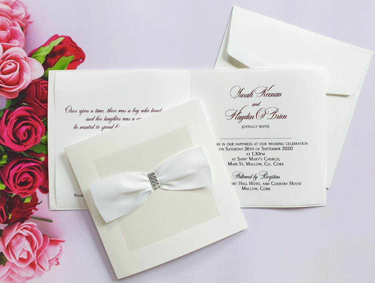 white shimmer wedding invitation